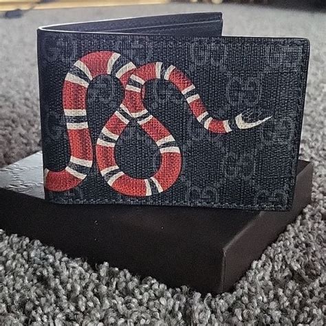 gucci belt snake gold|gucci snake wallet men's.